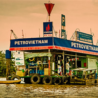 Buy canvas prints of Gas Station Vietnam Style by Mark Llewellyn