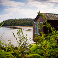 Buy canvas prints of Dylan Thomas Boat House, Laugharne, Wales, UK by Mark Llewellyn