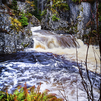 Buy canvas prints of Laggan Falls, Scotland, UK by Mark Llewellyn