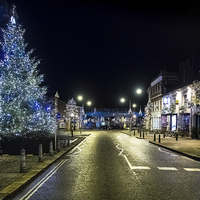Buy canvas prints of High Street at Christmas, Hungerford, Berkshire, E by Mark Llewellyn