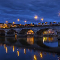 Buy canvas prints of Cognac Bridge by Night, Cognac, France by Mark Llewellyn