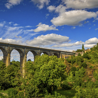Buy canvas prints of Spectacular Roman Viaduct, Dinan, France by Mark Llewellyn