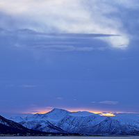 Buy canvas prints of Arctic Sundown, Lofoten, Norway by Mark Llewellyn
