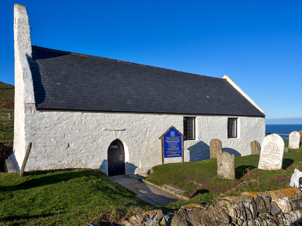 Holy Cross Church at Mwnt, Ceredigion, Wales, UK Picture Board by Mark Llewellyn