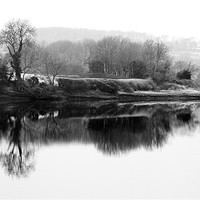 Buy canvas prints of Carew Castle Mill Pond Reflections by Simon West