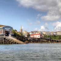 Buy canvas prints of Tenby Life Boat Houses by Simon West