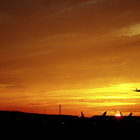 Buy canvas prints of A380 Take Off Into Sunset by Simon West