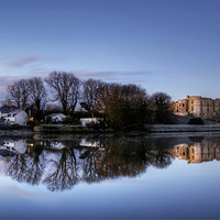 Buy canvas prints of Carew Castle at Dawn by Simon West