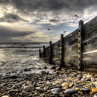 Buy canvas prints of Amroth winter beach by Simon West