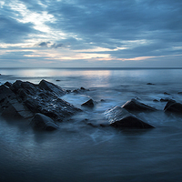 Buy canvas prints of Saundersfoot beach rocks by Simon West