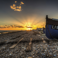 Buy canvas prints of  Worthing sunset and fishing boat by Simon West