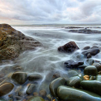 Buy canvas prints of Pebbles at high tide by nick woodrow