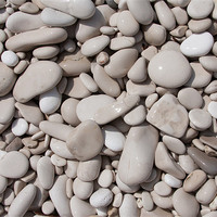 Buy canvas prints of Pebbles on the beach, Hvar. by Adam Clarkson