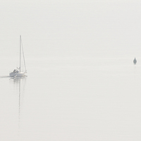Buy canvas prints of  A yacht departs in the mist by Richard Smith