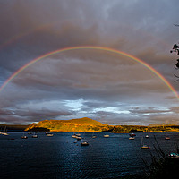 Buy canvas prints of A rainbow over Ben Tianavaig by Richard Smith