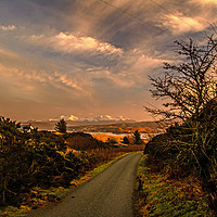 Buy canvas prints of Sunset light illuminates the snow covered Cuillin by Richard Smith