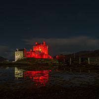 Buy canvas prints of Remembrance day floodlighting at Eilean Donan Cast by Richard Smith