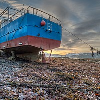 Buy canvas prints of Sunrise colour beyond a beached vessel. #2 by Richard Smith