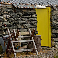 Buy canvas prints of Outhouse yellow door by Richard Smith