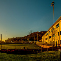 Buy canvas prints of The all weather pitches at Portree High School. by Richard Smith
