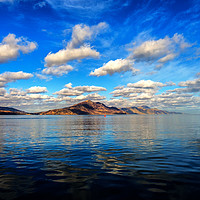 Buy canvas prints of Clouds reflected in the Sound of Raasay by Richard Smith