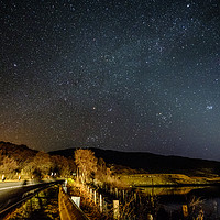 Buy canvas prints of A mainroad by car light and star light. by Richard Smith