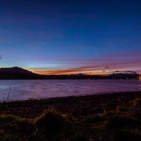 Buy canvas prints of Loch Portree sunrise viewed from the grassy shore  by Richard Smith