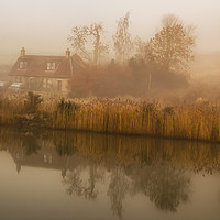 Buy canvas prints of A cottage and reflection on misty winter's morning by Richard Smith