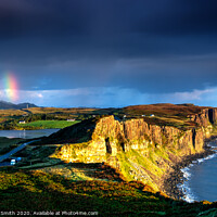 Buy canvas prints of The end of a rainbow at sunrise, the cliffs of Kilt Rock with loch Mealt behind. by Richard Smith