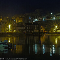 Buy canvas prints of Illuminated buildings at the beach end of Portree Harbour by Richard Smith