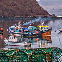 Buy canvas prints of Fishermen at work in Portree harbour photographed from behind a stack of creels. by Richard Smith