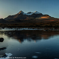 Buy canvas prints of First winter sunlight upon the Black Cuillin mountains of Skye. by Richard Smith