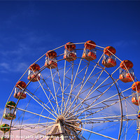 Buy canvas prints of Big Wheel, Blue Sky by Vicky Mitchell