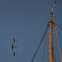 Buy canvas prints of Spitfire Fly Past by Nigel Jones