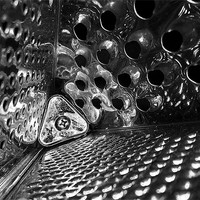Buy canvas prints of Inside the cheese grater by Michael Thompson
