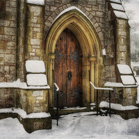 Buy canvas prints of Snowy Church Door by Ian Mitchell
