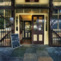 Buy canvas prints of Coffee House by Ian Mitchell