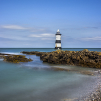 Buy canvas prints of Penmon Lighthouse  by Ian Mitchell