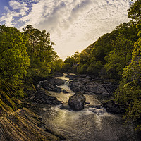 Buy canvas prints of River Sunset by Ian Mitchell