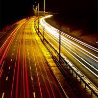 Buy canvas prints of Cars on Motorway by Stuart Vivian
