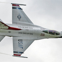 Buy canvas prints of Thunderbirds F-16 topside pass by Rachel & Martin Pics