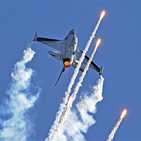 Buy canvas prints of F-16 firing flare by Rachel & Martin Pics