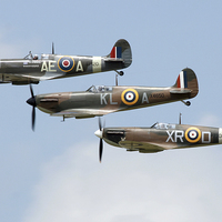 Buy canvas prints of Spitfire formation by Rachel & Martin Pics