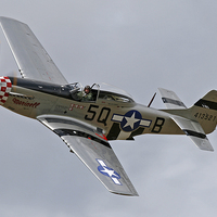 Buy canvas prints of  P-51 Mustang Marinell topside pass by Rachel & Martin Pics
