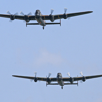 Buy canvas prints of  Two lancasters flypast by Rachel & Martin Pics