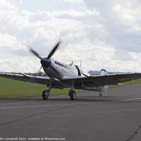 Buy canvas prints of Spitfire taxiing in by Keith Campbell