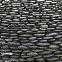 Buy canvas prints of Wall of pebbles by Keith Campbell