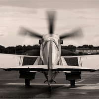 Buy canvas prints of Spitfire Taxies Out - sepia by Keith Campbell