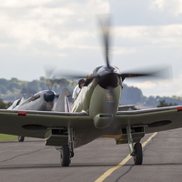 Buy canvas prints of Spitfire pair taxi in - colour version by Keith Campbell