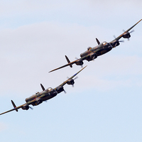 Buy canvas prints of  AVRO Lancaster pair by Keith Campbell